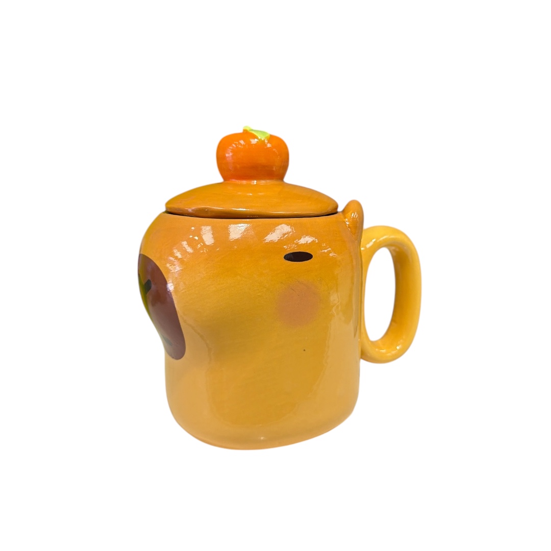 Taza cara capibara tapa con naranja