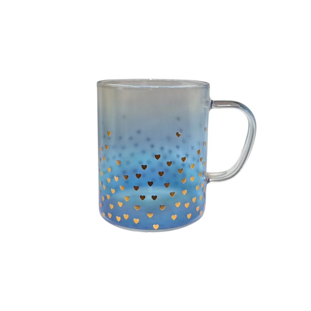 Taza de vidrio transparente con cuchara